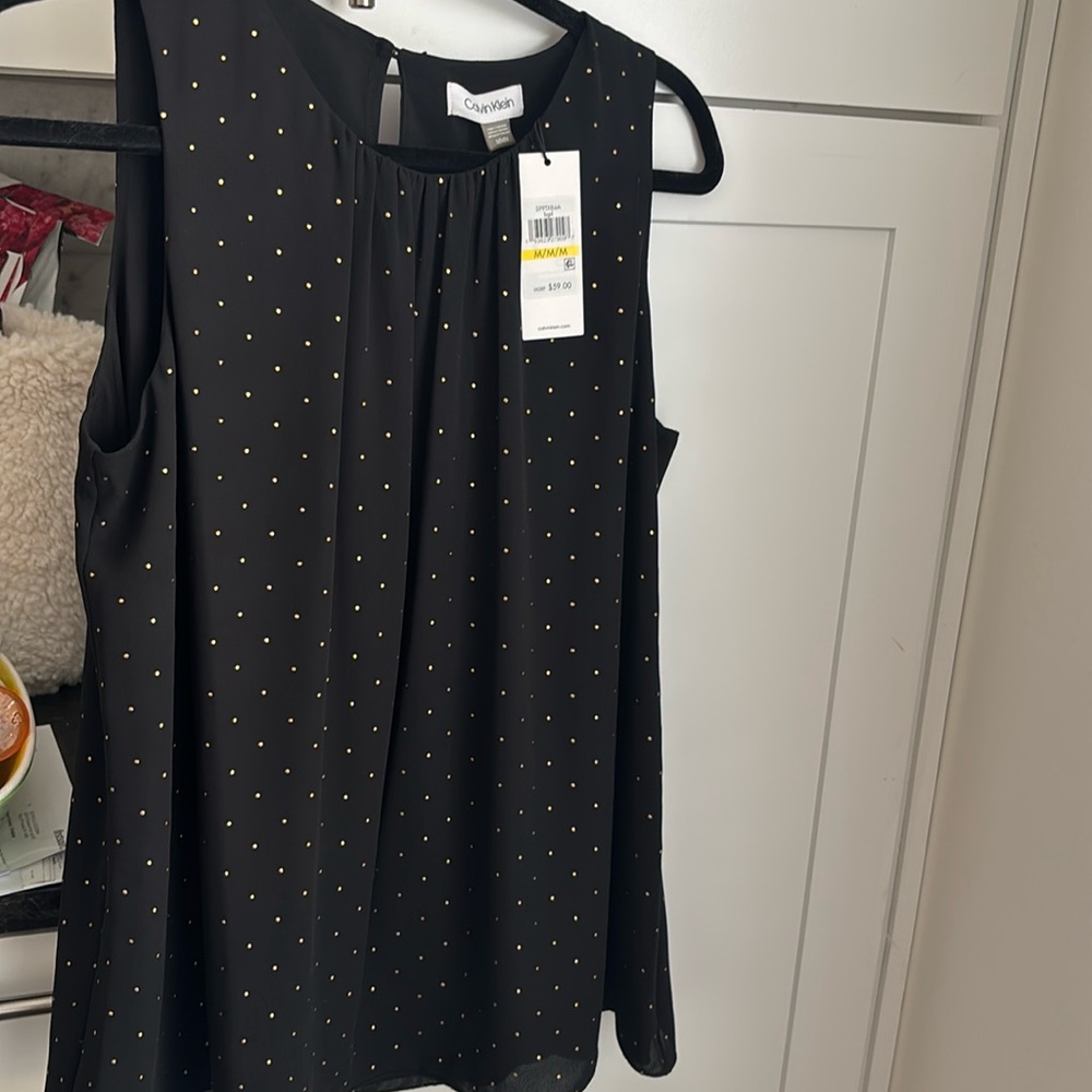 Calvin Klein flouncy black top with gold dots/beads